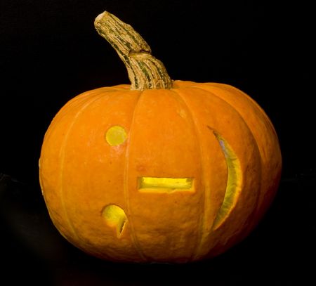 Halloween pumpkin isolated on black background with internet smile ;-)の写真素材