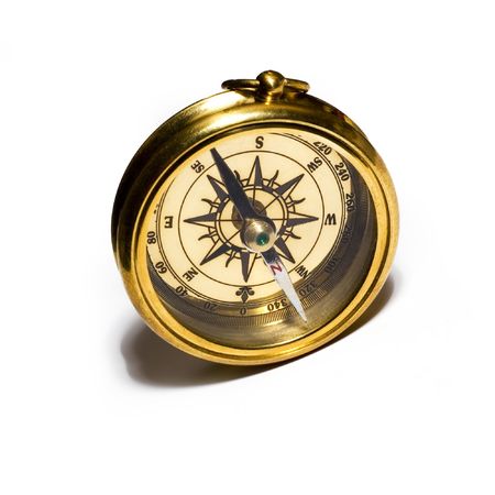 Old style gold compass on white backgroundの写真素材