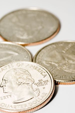 Four quarters on white backgroundの写真素材