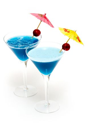 Cocktails with blue curacao isolated on white backgroundの写真素材