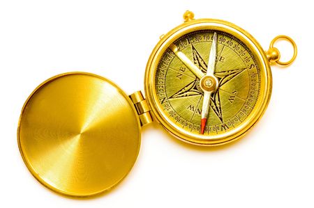 Old style brass compass on white backgroundの写真素材