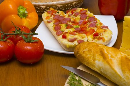 Baguettes with pepperoni and ingredientsの写真素材