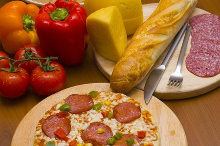 Pepperoni pizza and ingredientsの写真素材