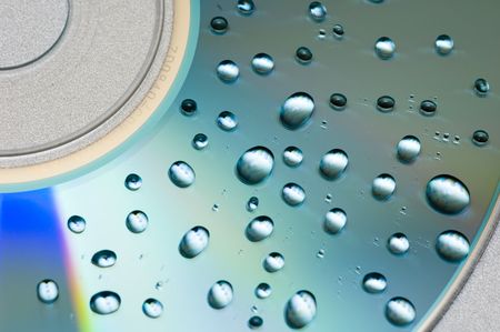 Water drops on cd backgroundの写真素材