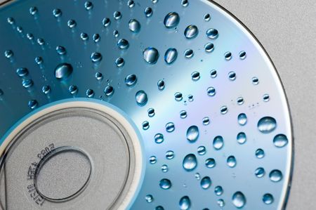 Water drops on cd backgroundの写真素材