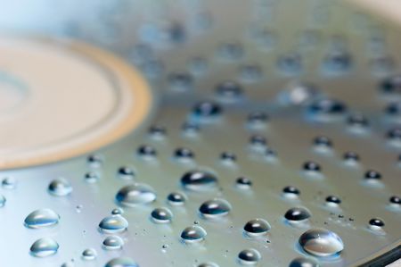 Water drops on cd backgroundの写真素材