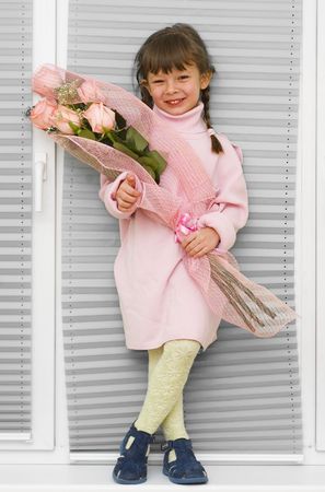 Little bride's friend with bouquetの写真素材