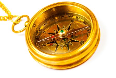 Old style brass compass on white backgroundの写真素材