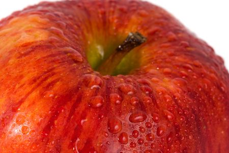 Red apple with water drops close upの写真素材