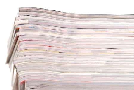 Stack of magazines isolated on white background
