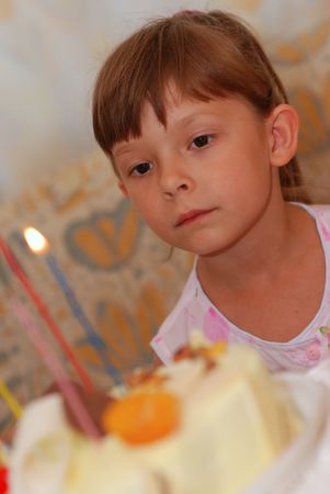 Little girl with birthday cake 