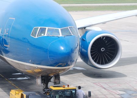Plane in airport getting ready to fly