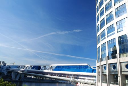 Modern office building against blue skyの写真素材