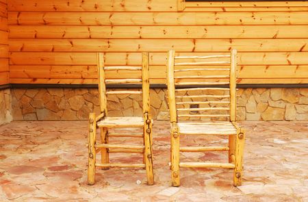 Backyard: two chairs in front of の写真素材
