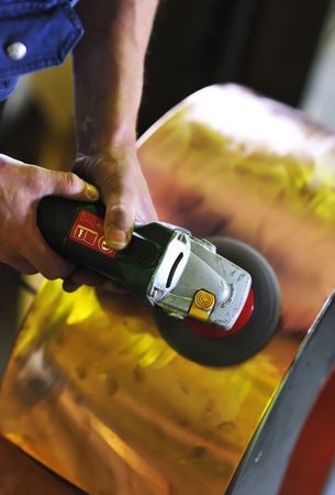 Grind tool in worker's hands