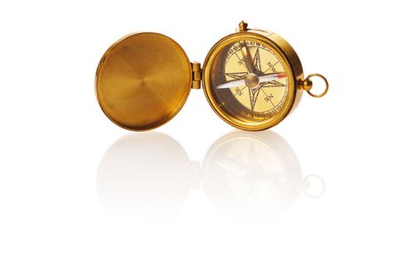 Old compass isolated on white background with soft reflectionの写真素材