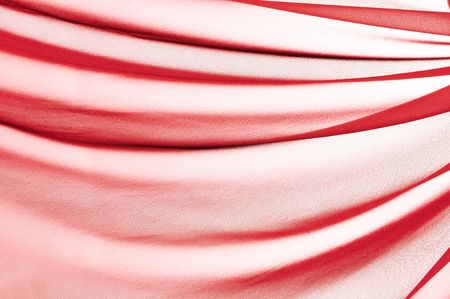 Beautiful folded red silk backgroundの写真素材