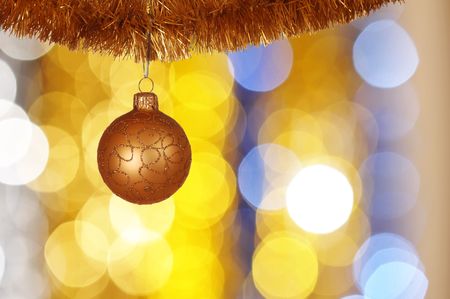 Christmas ball against defocused background with shallow depth of field and copyspaceの写真素材