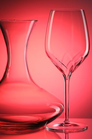 Glass still life over red backgroundの写真素材