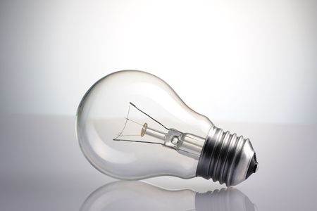 Light Bulb over grey background
