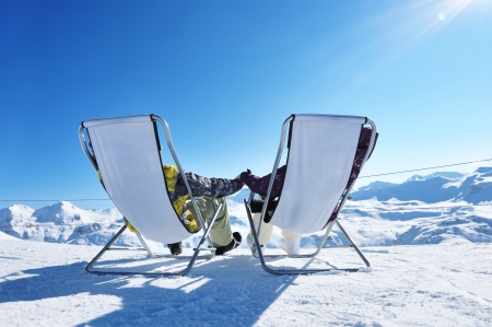 Couple at mountains in winter, Val-d'Isere, Alps, Franceの写真素材
