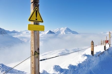 Mountains in clouds with snow in winter, Val-d'Isere, Alps, Franceの写真素材