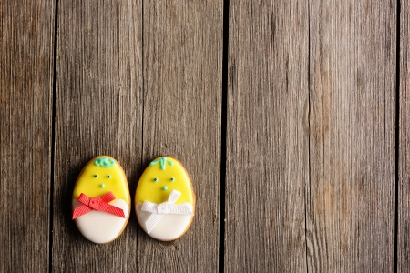 Easter homemade gingerbread cookie over wooden table