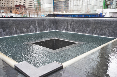 NEW YORK CITY - MARCH 31: New York 9/11 Memorial at World Trade Center Ground Zero on March 31, 2014. のeditorial素材
