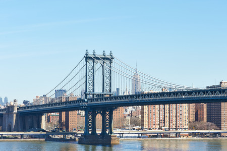 Manhattan Bridge and skyline view from Brooklyn Bridge in New York City