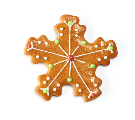 Christmas gingerbread cookie isolated on whiteの写真素材