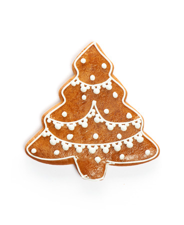 Christmas gingerbread cookie isolated on whiteの写真素材