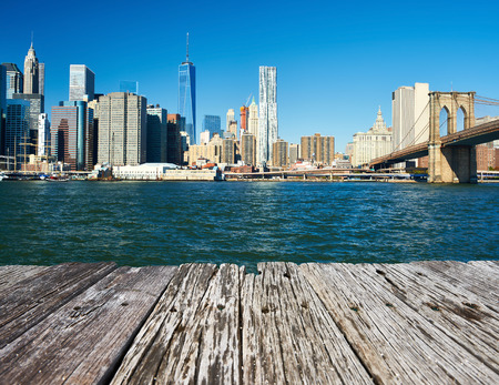 Lower Manhattan skyline and Brooklyn bridge in New York Cityの写真素材
