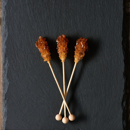 Brown sugar sticks over slate