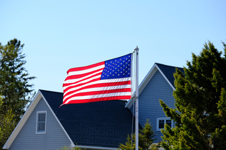 American flag at suburban neighborhoodの写真素材