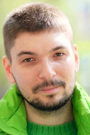 Man in green outdoor portraitの写真素材