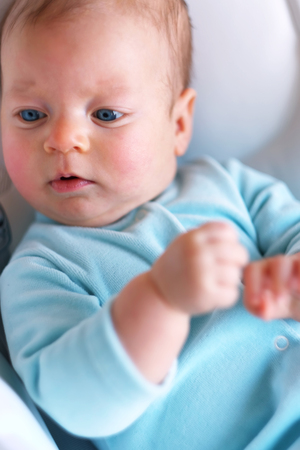 Three months old baby in chair