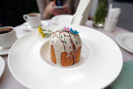 Traditional easter cake at restaurant outdoor tableの写真素材