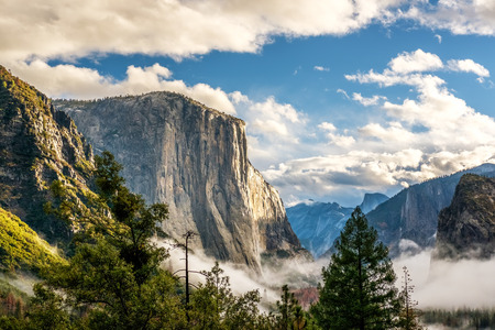 Yosemite National Park Valley at cloudy autumn morning from Tunnel View. Low clouds lay in the valley. California, USA.の写真素材