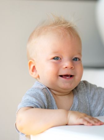 Baby boy with blue eyes portraitの写真素材