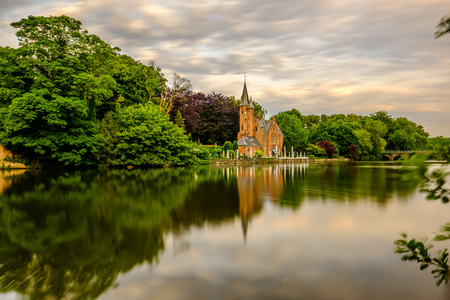 Bruges (Brugge) cityscape with Minnewater lake, Flanders, Belgiumの写真素材