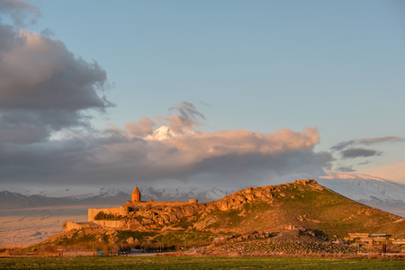 Ancient monastery Khor Virap in Armenia with Ararat mountain at background at sunrise. Was founded in years 642-1662.のeditorial素材