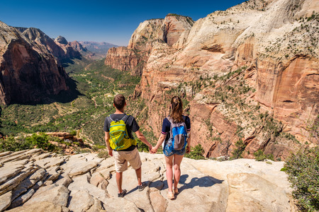 Tourists with backpack hiking in Zion National Park, Utah, USAの写真素材