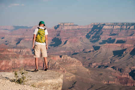 Tourist with backpack at Grand Canyon, Arizona, USAの写真素材