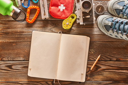Travel items for hiking tourism still life over wooden backgroundの写真素材