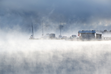 Morning foggy misty landscape at Shadow Mountain Lake. Rocky Mountains, Colorado, USA.の写真素材