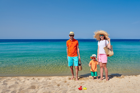 Family on beach, young couple with three year old boy. Sithonia, Greeceの写真素材