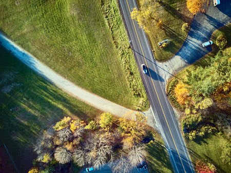 Scenic highway at autumn in New Hampshire, USA. Fall in New England. Aerial drone shot.の写真素材