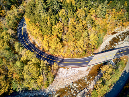 Scenic Mohawk Trail winding highway at autumn, Massachusetts, USA. Fall in New England. Aerial drone shot.の写真素材