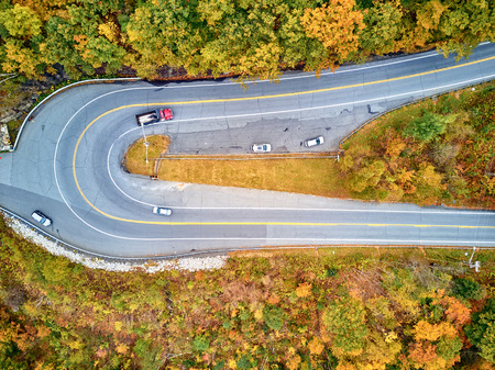 Scenic Mohawk Trail highway hairpin turn in autumn, Massachusetts, USA. Fall in New England. Aerial drone shot.の写真素材