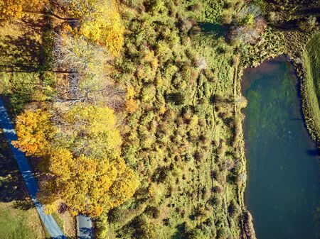 Scenic landscape with farm at autumn in Woodstock, Vermont, USA. Fall in New England. Aerial drone shot.の写真素材